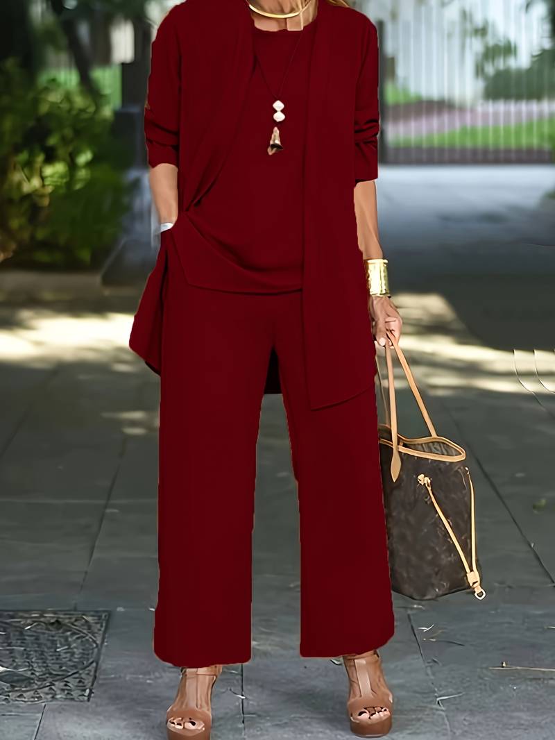 Women's elegant three-piece pantsuit set in classic black