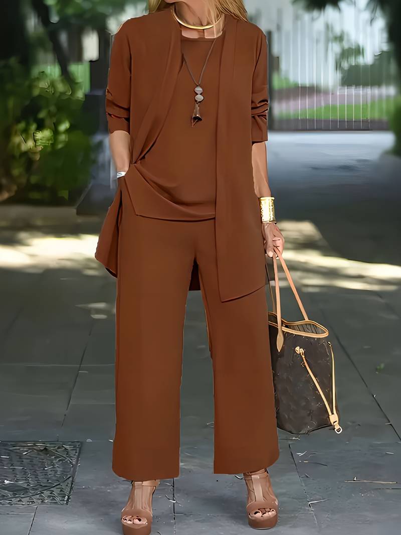 Full view of the women's elegant three-piece pantsuit, showcasing tailored fit