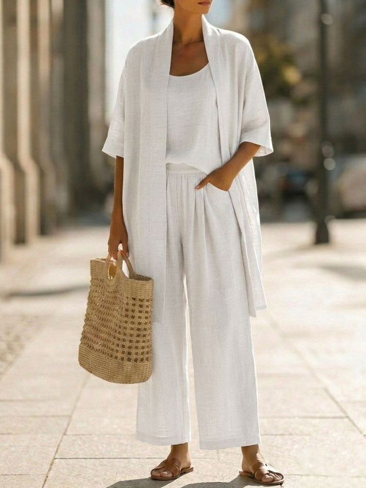 Women's elegant three-piece set: relaxed fit, breathable top, wide-leg pants & matching cardigan for versatile style.