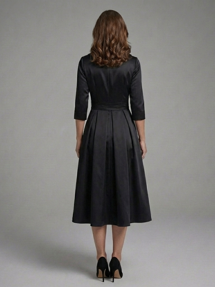 Black formal wrap midi dress with three-quarter sleeves, sophisticated for cocktail parties or evening wear.