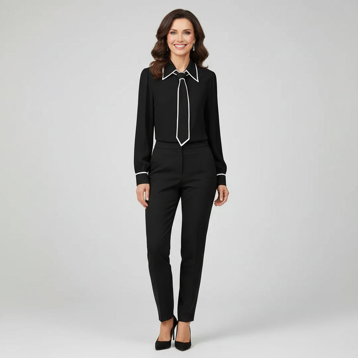 Women's elegant tie-neck blouse in a versatile style, perfect for office or occasion wear.