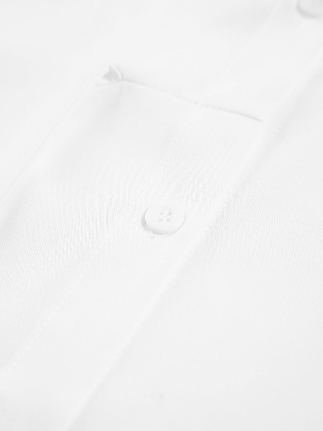 Crisp white long sleeve women's shirt with a chic tie waist, ideal for office wear or casual elegance.