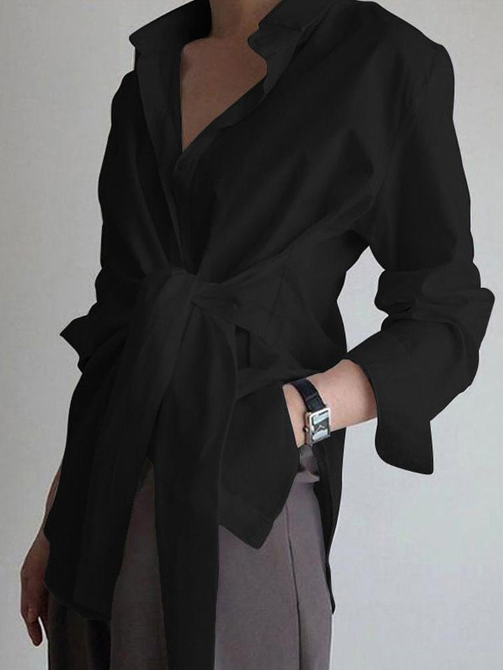 Fashionable women's long sleeve top with an elegant tie waist, a chic and versatile wardrobe staple.