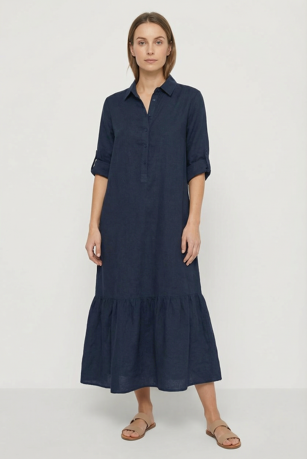 Stylish women's maxi dress with a tiered hem & button-front. Features long sleeves & a relaxed fit for all seasons.
