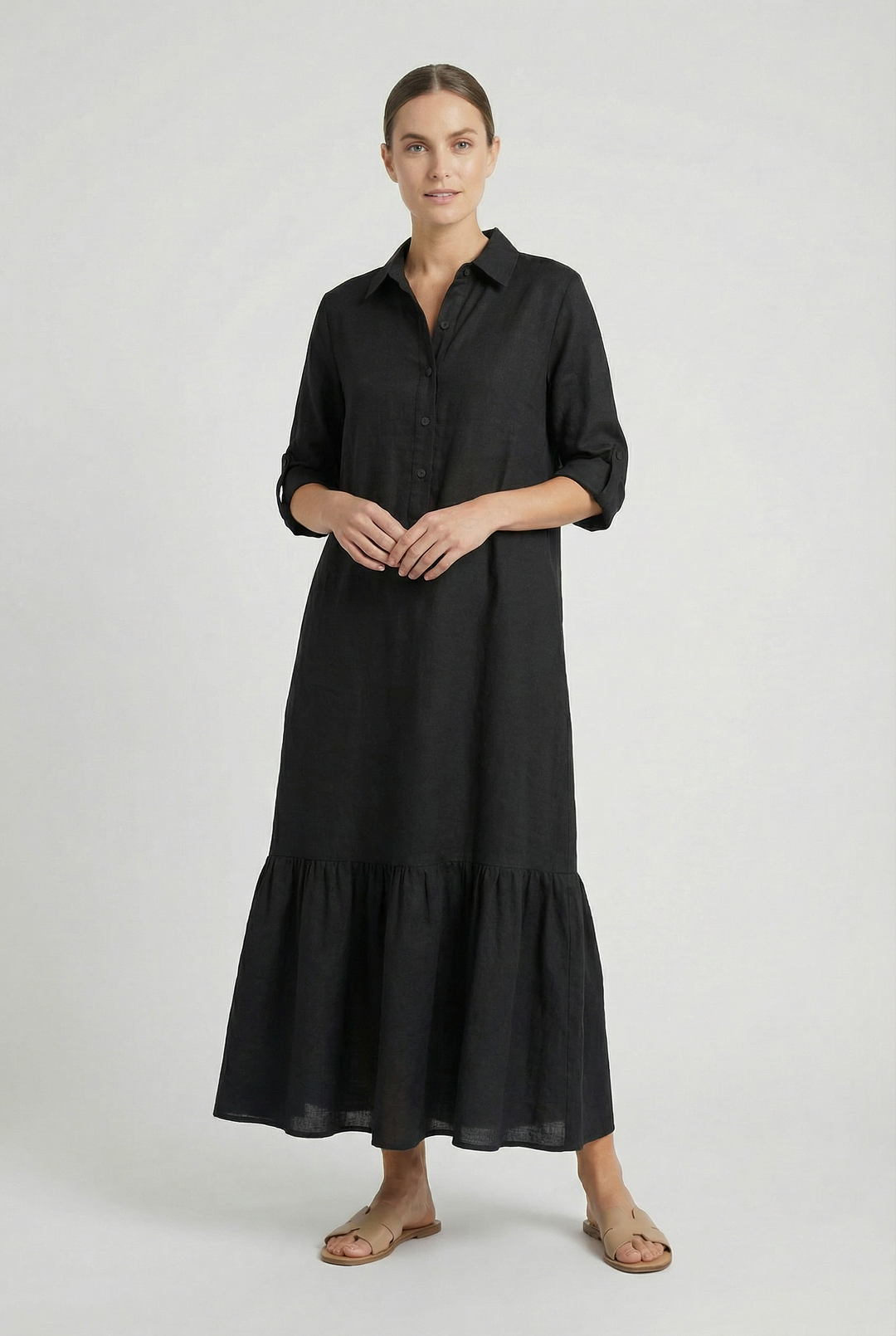 Relaxed fit women's maxi dress. Elegant button-front shirt dress with long sleeves & a stylish tiered hem.