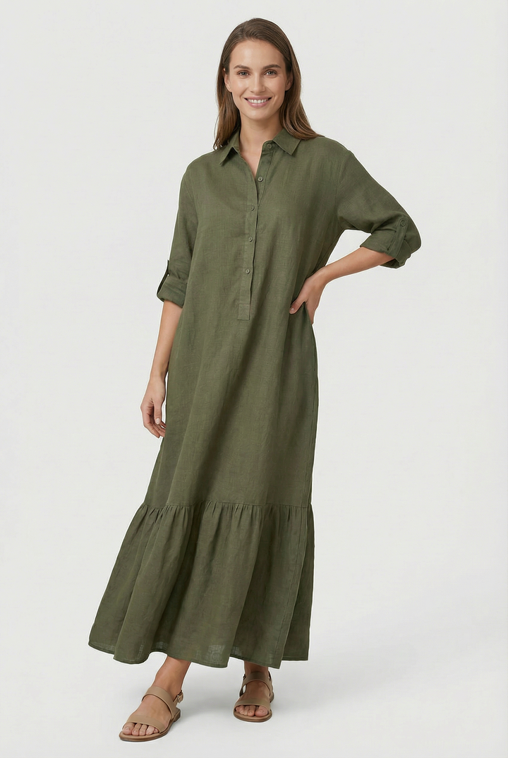 Beautiful women's shirt maxi dress with a button-front, long sleeves, and a flowy tiered design. Elegant & versatile.
