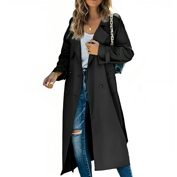Long women's trench coat with a sharp lapel and flattering belt. Essential chic outerwear for any season.