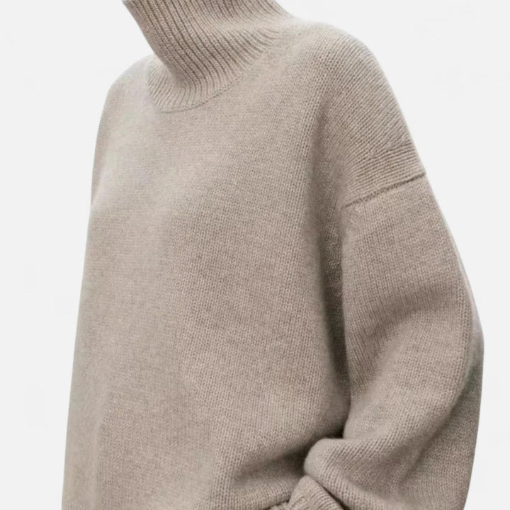 Close-up of soft, warm women's long sleeve wool turtleneck sweater.
