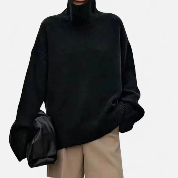 Model wearing a sophisticated classic style women's turtleneck wool sweater.