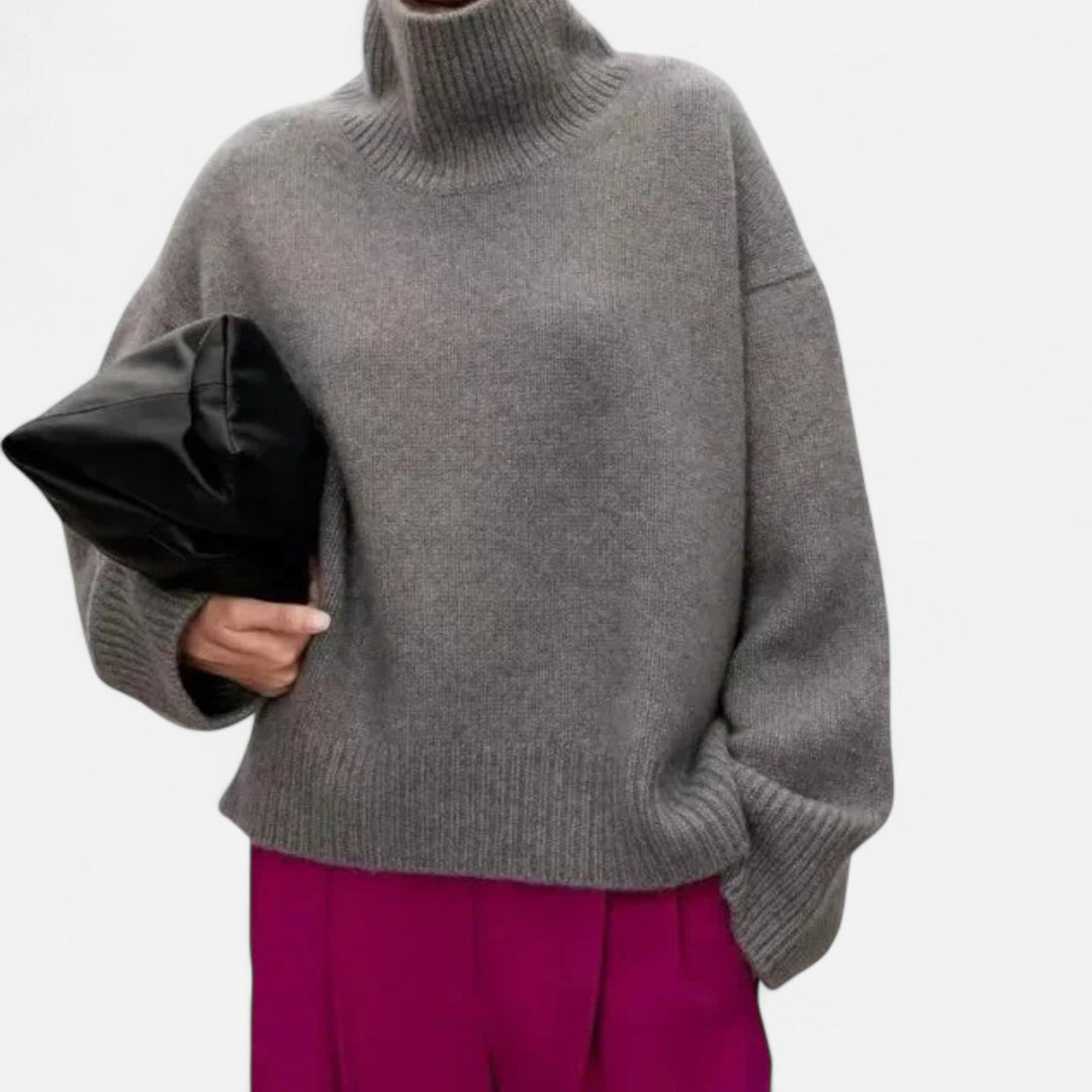 Luxurious women's turtleneck sweater made from premium, warm wool.