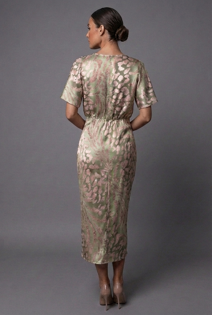 Stylish abstract print midi dress with elegant twist front and flutter sleeves, perfect for summer or special occasions.