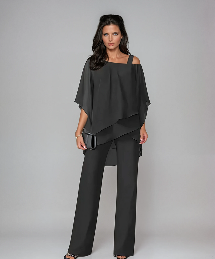 Flowy women's two-piece layered set with relaxed fit top & comfortable trousers, ideal for spring/summer elegance.