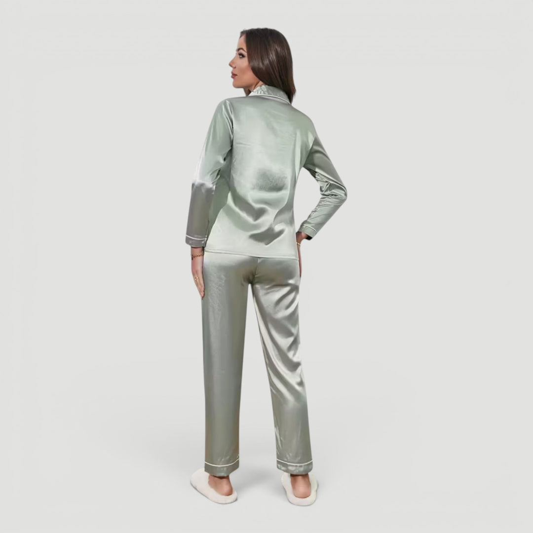 Smooth, soft fabric women's two-piece pajama set, offering elegant comfort for sleep and lounging.