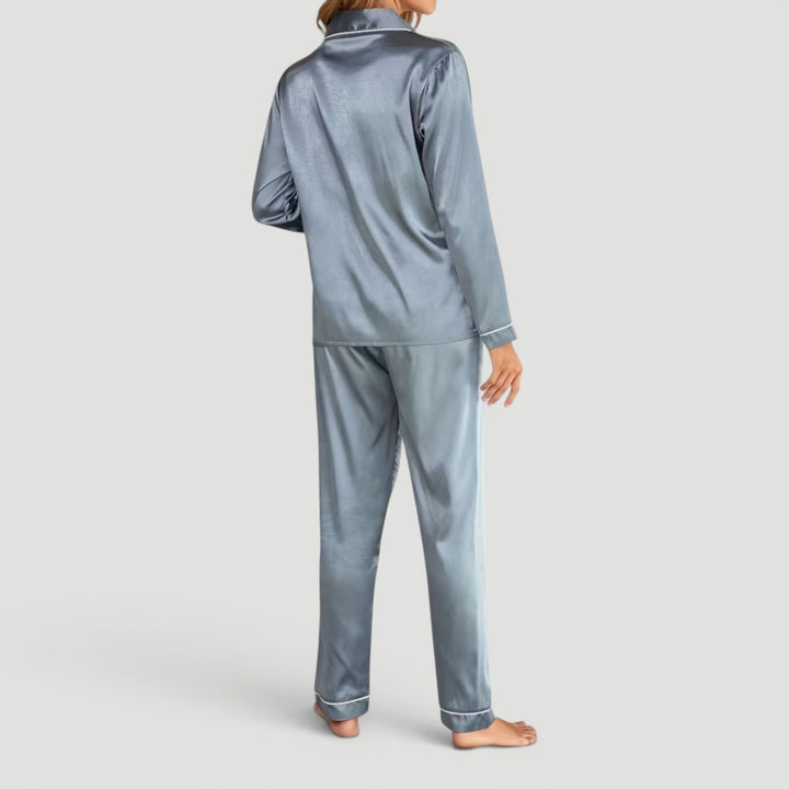 Stylish women's two-piece sleepwear set, featuring a top and matching pants for lounge comfort.