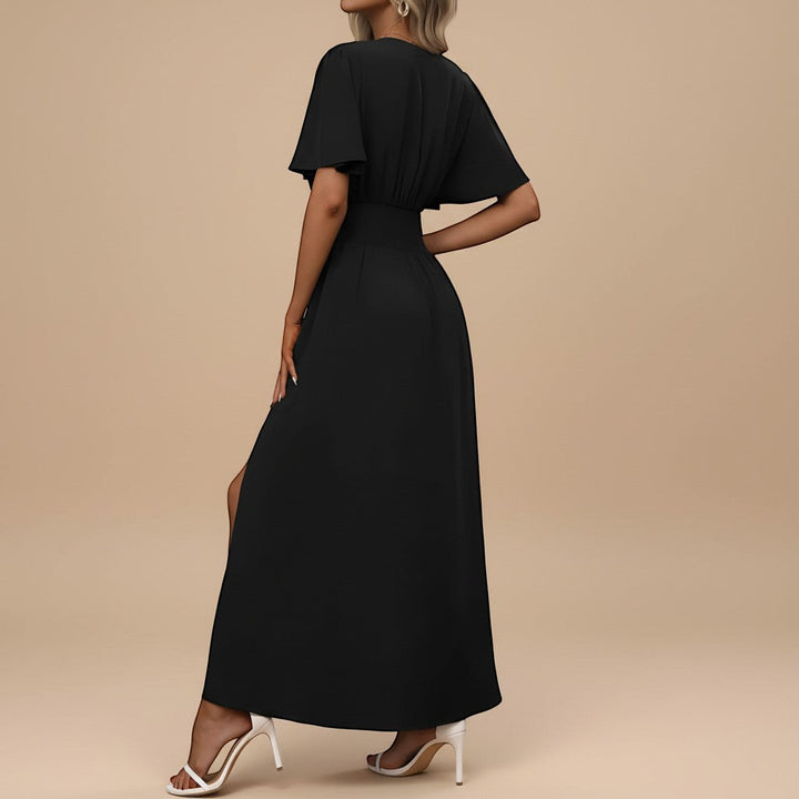 Chic V-neck flutter sleeve maxi dress, perfect for sophisticated party or special occasion wear.