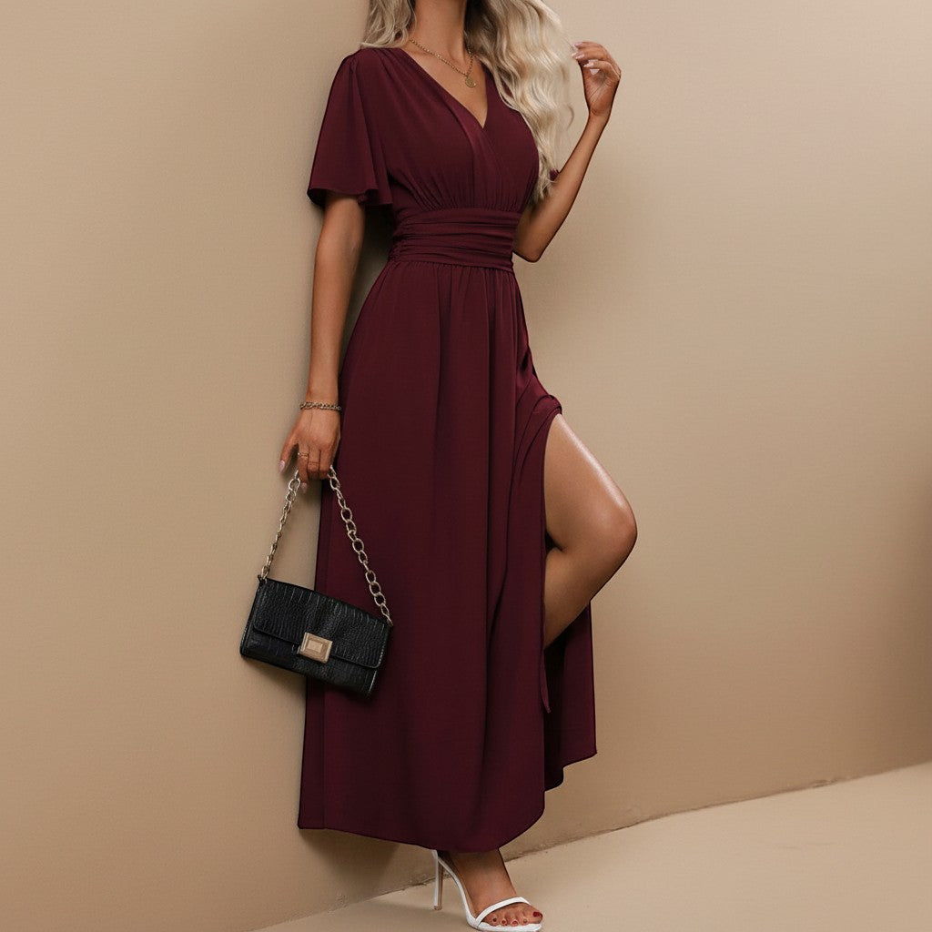 Women's V-neck maxi dress with delicate flutter sleeves, offering an elegant & sophisticated look.