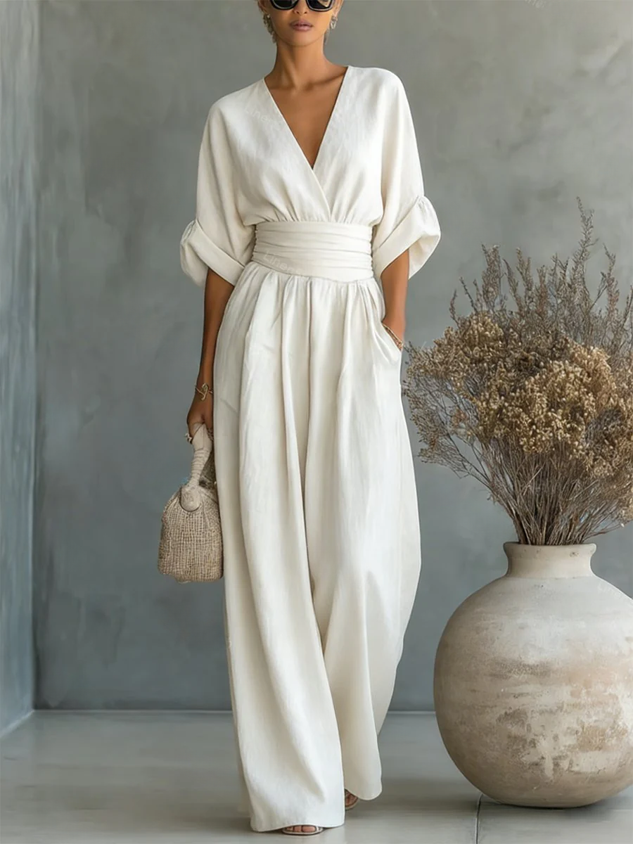 Versatile women's V-neck jumpsuit, ideal for workwear, smart casual, or elegant evening wear. All-day comfort.