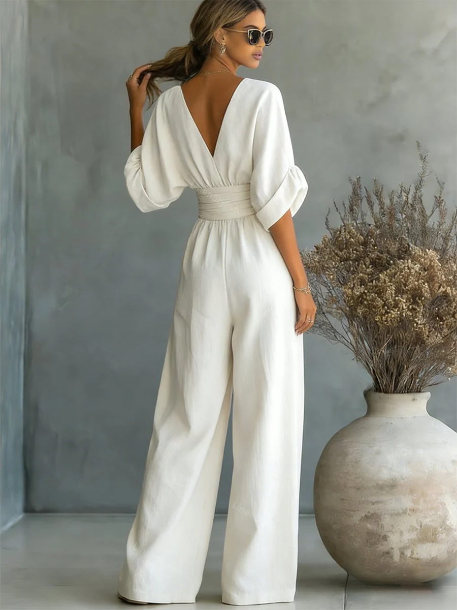 Chic women's V-neck jumpsuit in a flattering one-piece design. Elegant and versatile for any occasion.