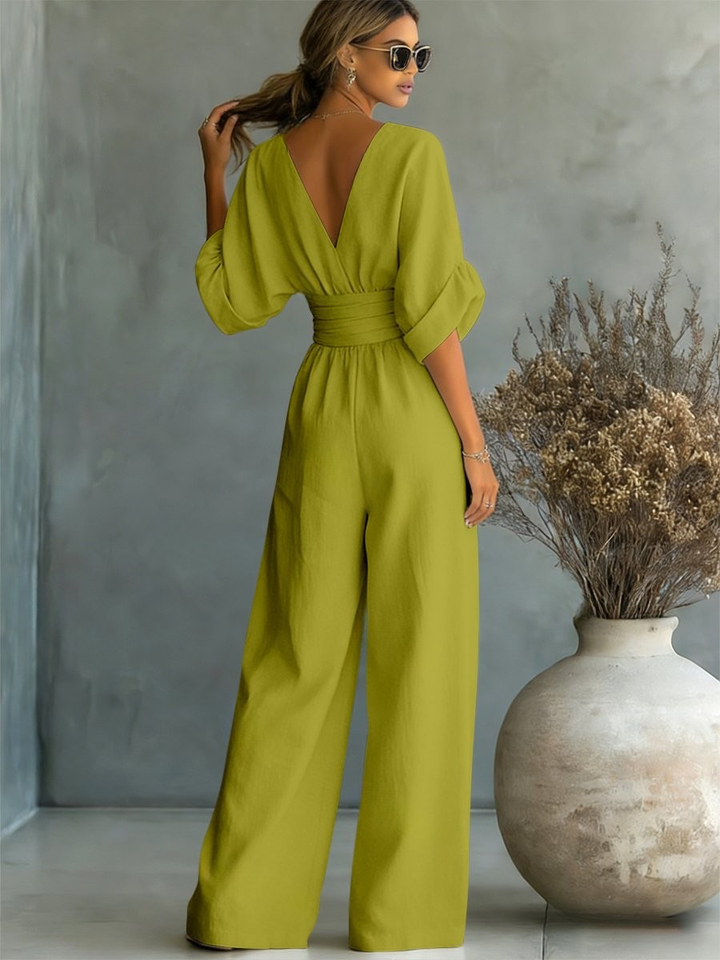 Smooth fabric women's elegant V-neck jumpsuit. Flattering and versatile for all occasions.