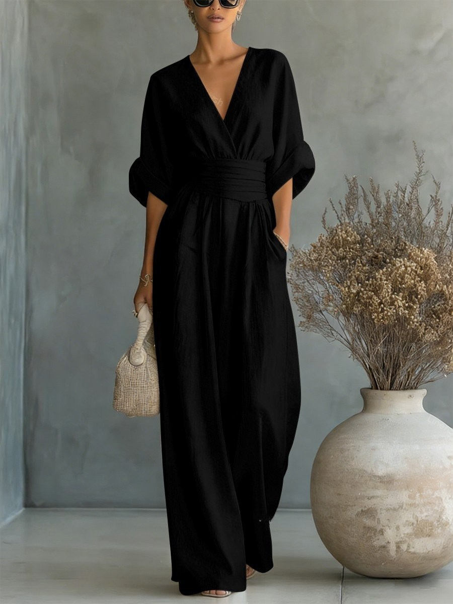 Professional women's V-neck jumpsuit, ideal workwear. Elegant, comfortable, and versatile for office to dinner.