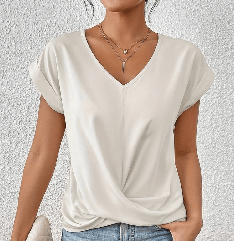 Flattering ladies V-neck top with stylish twist front, perfect short sleeve blouse for summer fashion.