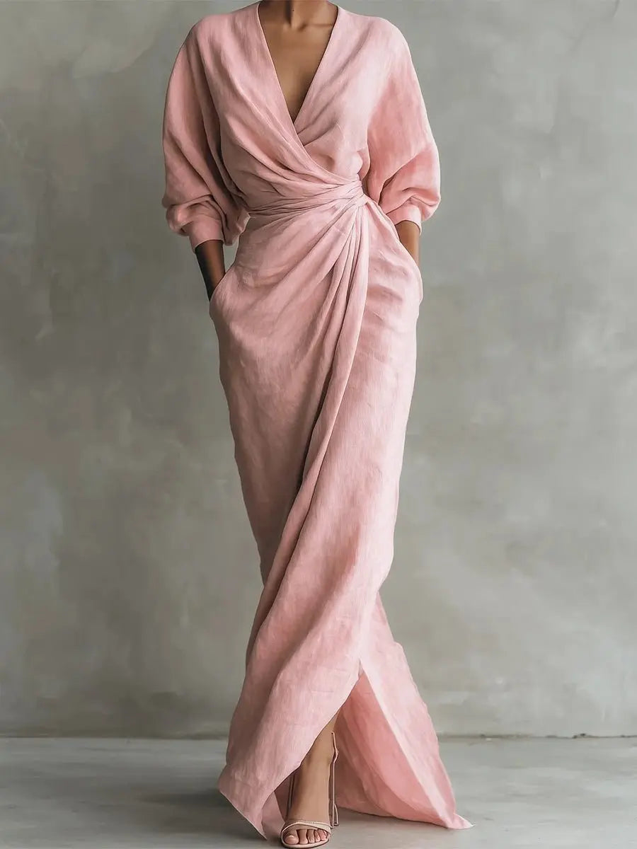 Women's elegant V-neck wrap maxi dress with long sleeves & ruched waist. Perfect for occasion wear.