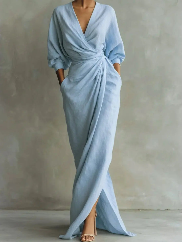Elegant women's long sleeve V-neck wrap maxi dress featuring a stylish ruched waist. Ideal for special occasions.