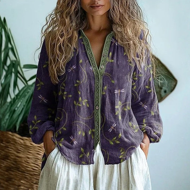 Women's elegant vintage leaf print button-down shirt. Long sleeve, versatile for casual or workwear. Sophisticated style.