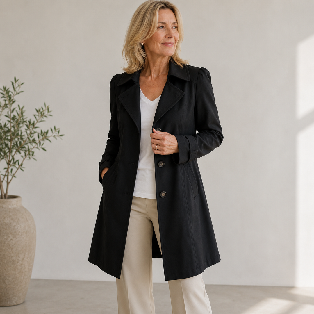 Women's elegant vintage trench coat, embodying classic style, a stylish versatile outerwear piece.