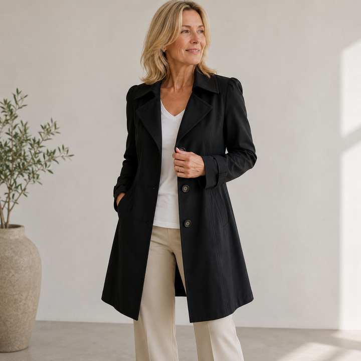 Women's elegant vintage trench coat, embodying classic style, a stylish versatile outerwear piece.