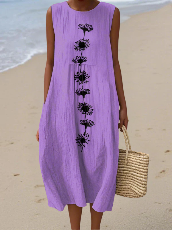Women's elegant violet bloom floral sleeveless midi dress for summer. Comfortable & flowy day or evening wear.