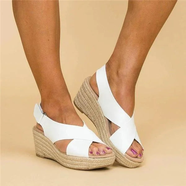 Comfortable platform wedge sandals for women, offering height and support.