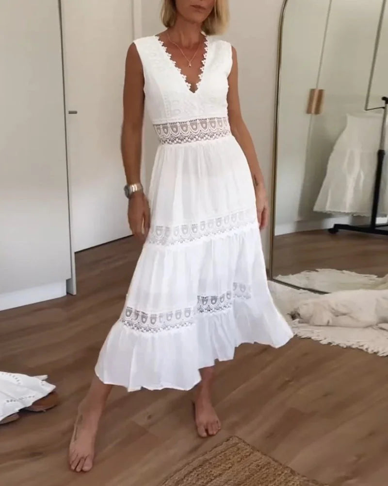 Women's elegant white boho tiered midi dress with V-neck, sleeveless design, perfect for summer casual chic.