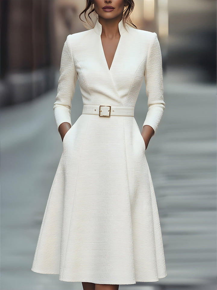 Sophisticated white belted V-neck midi dress for women. Elegant formal occasion wear with a flattering A-line silhouette.