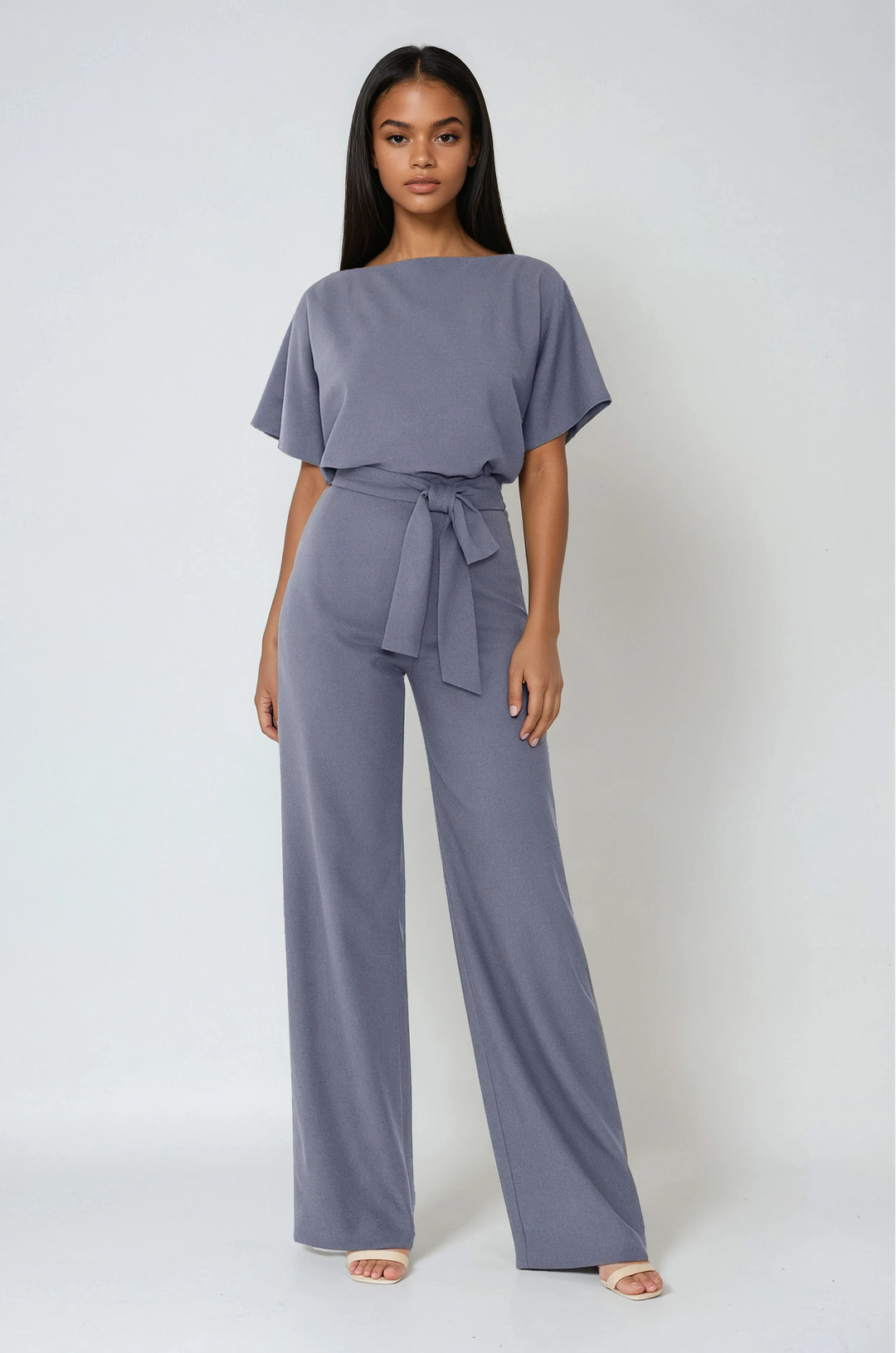 Women's elegant wide-leg jumpsuit with a stylish waist tie. Perfect for comfortable casual wear & spring fashion.