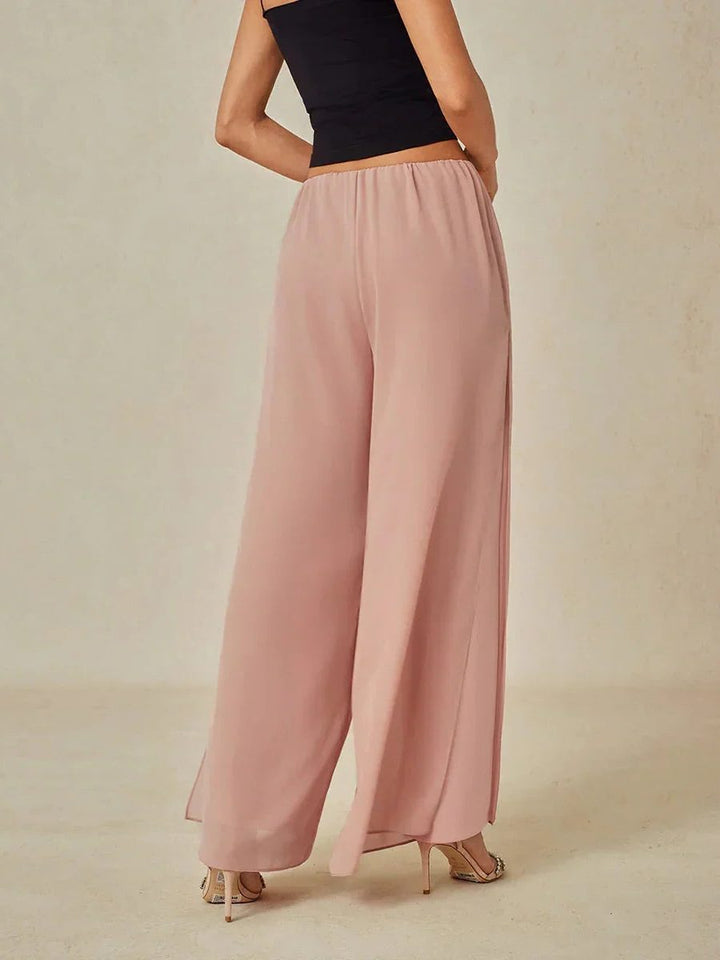 Elegant women's flowy wide leg trousers with a unique overlay detail.