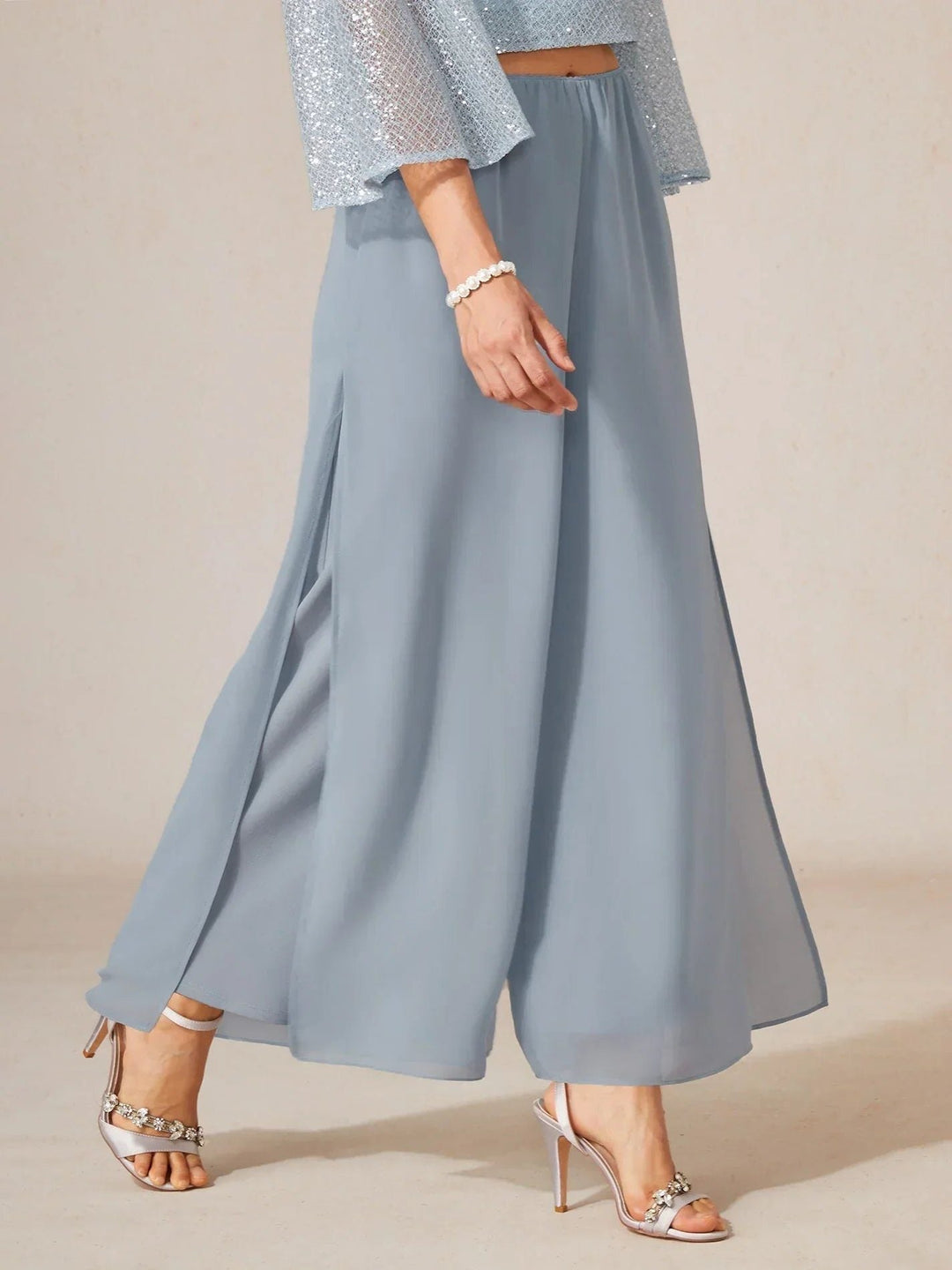 Elegant flowy women's wide leg trousers with a unique overlay design and comfort.