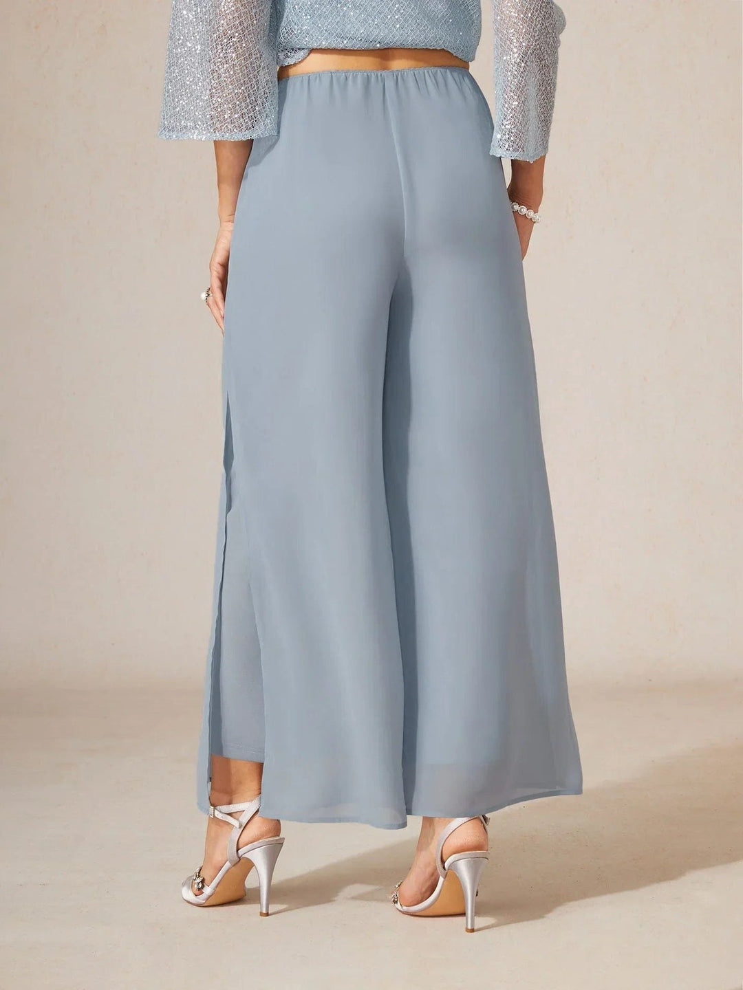 Women's comfortable wide leg pants, featuring an elegant overlay and tie waist.
