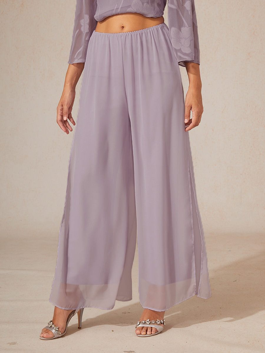 Fashionable women's wide leg trousers for evening wear, comfortable and flowy.
