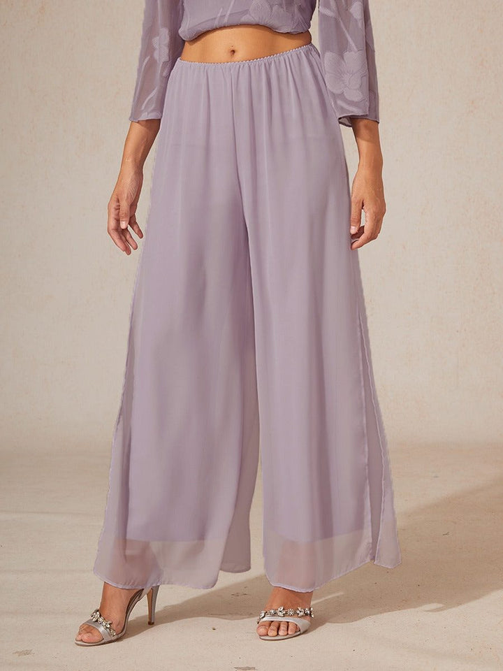 Fashionable women's wide leg trousers for evening wear, comfortable and flowy.