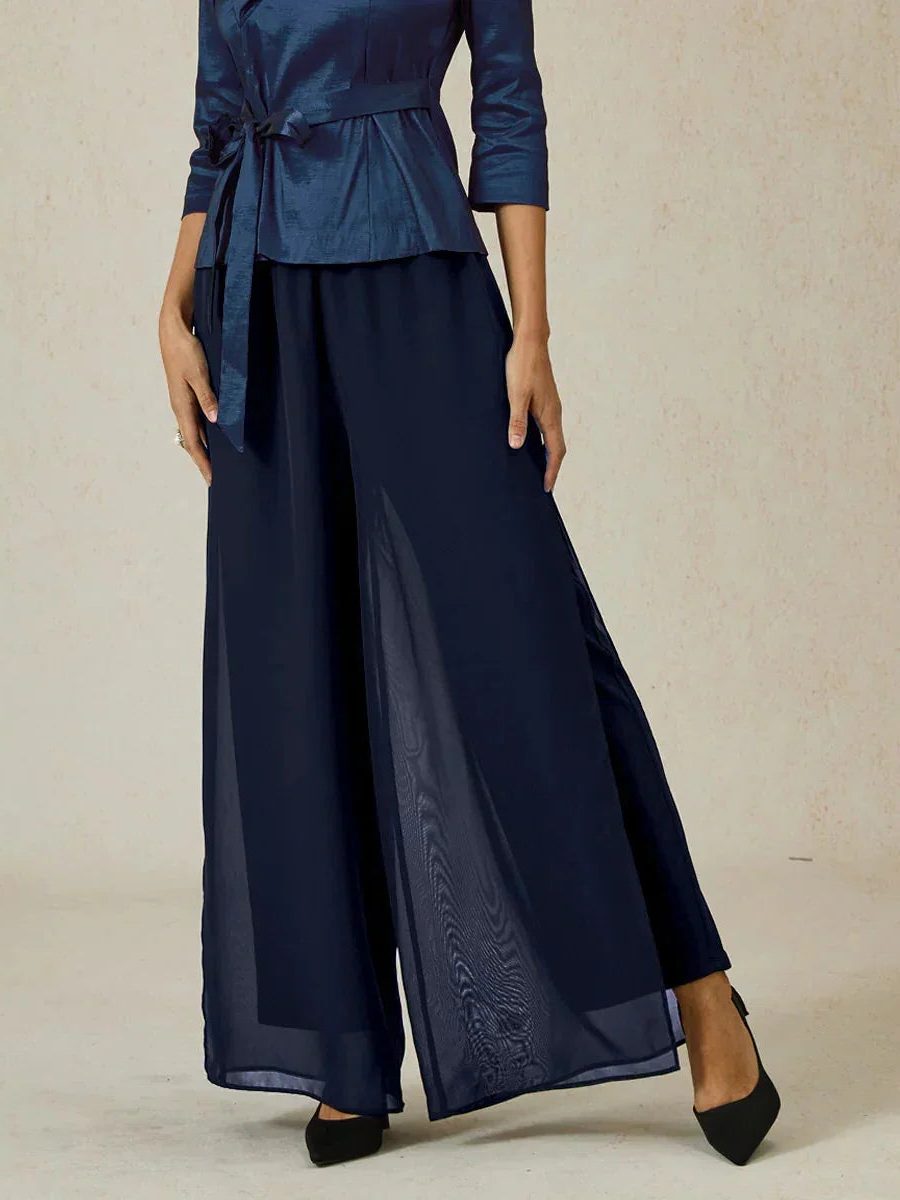 Versatile wide leg trousers for women, ideal as elegant dress pants or evening wear.