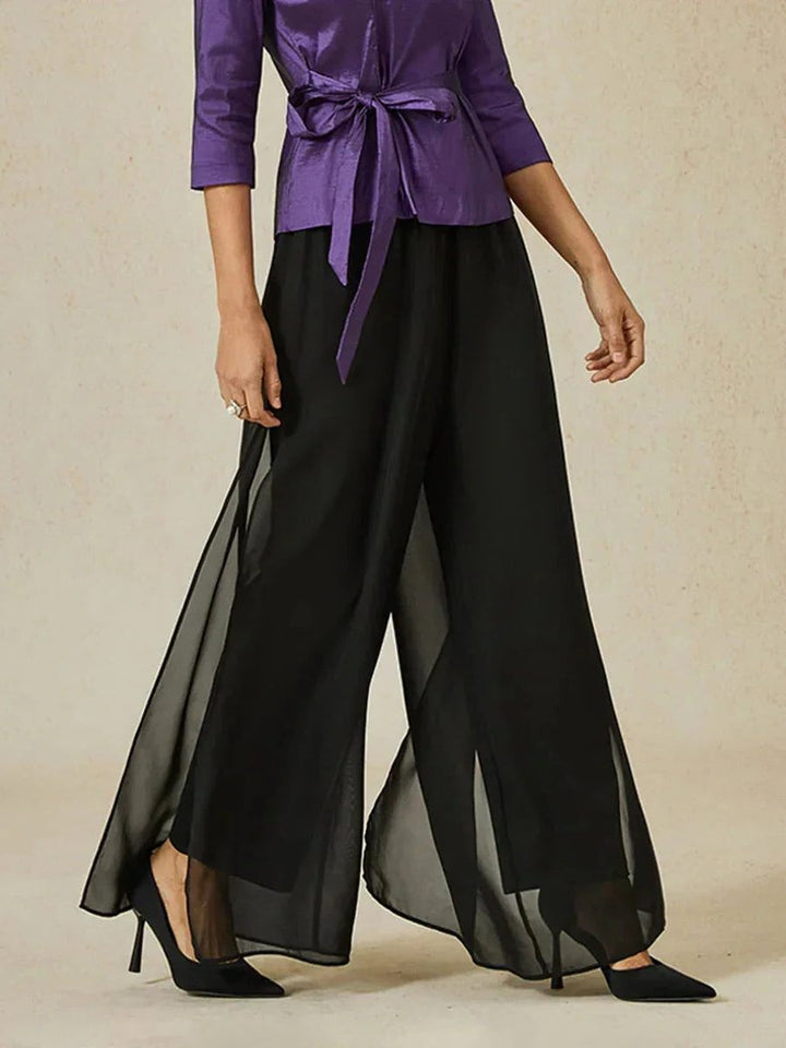 Comfortable women's flowy wide leg trousers with a stylish overlay design.