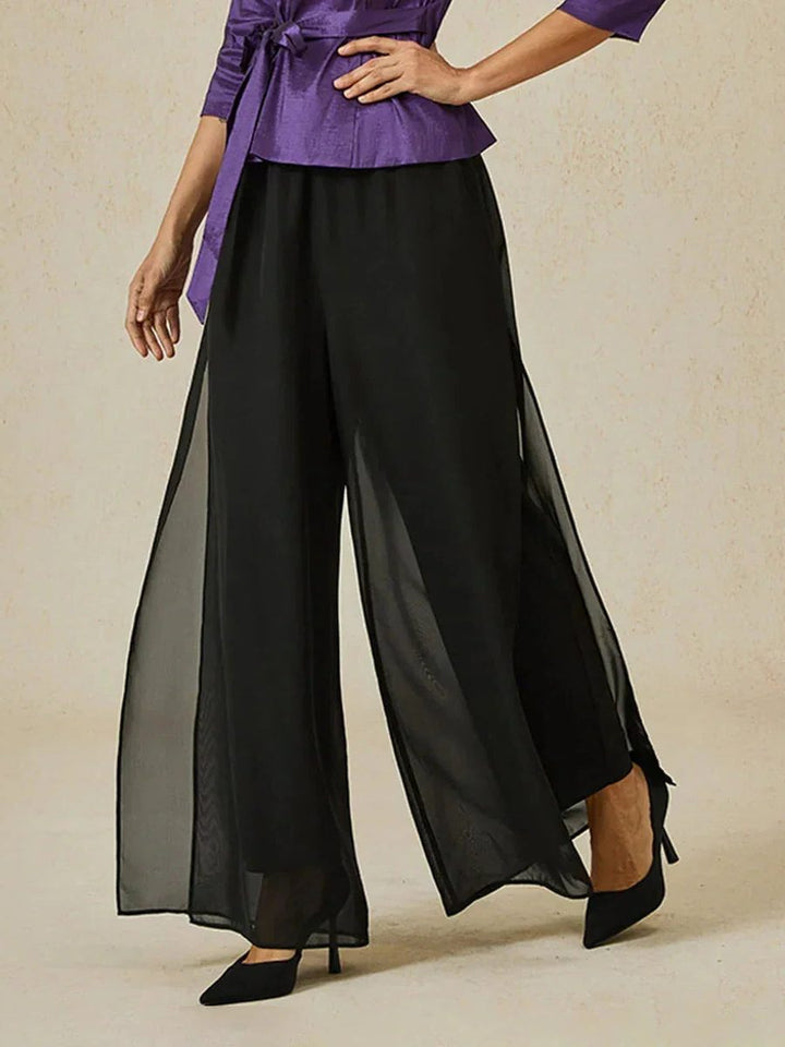 Elegant women's wide leg trousers, perfect for evening wear or fashion-forward outfits.