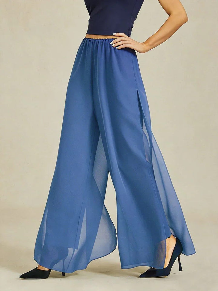 Women's wide leg pants featuring a sophisticated overlay design and comfy fit.