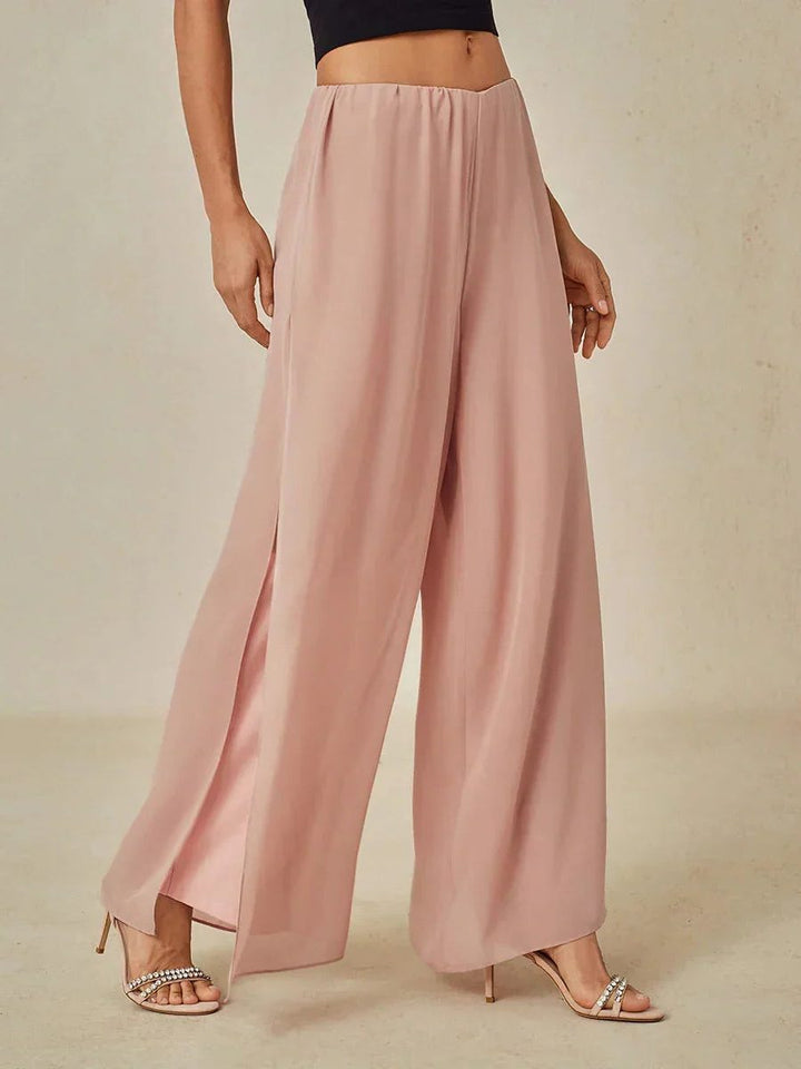 Women's comfortable wide leg dress pants with an elegant overlay design.