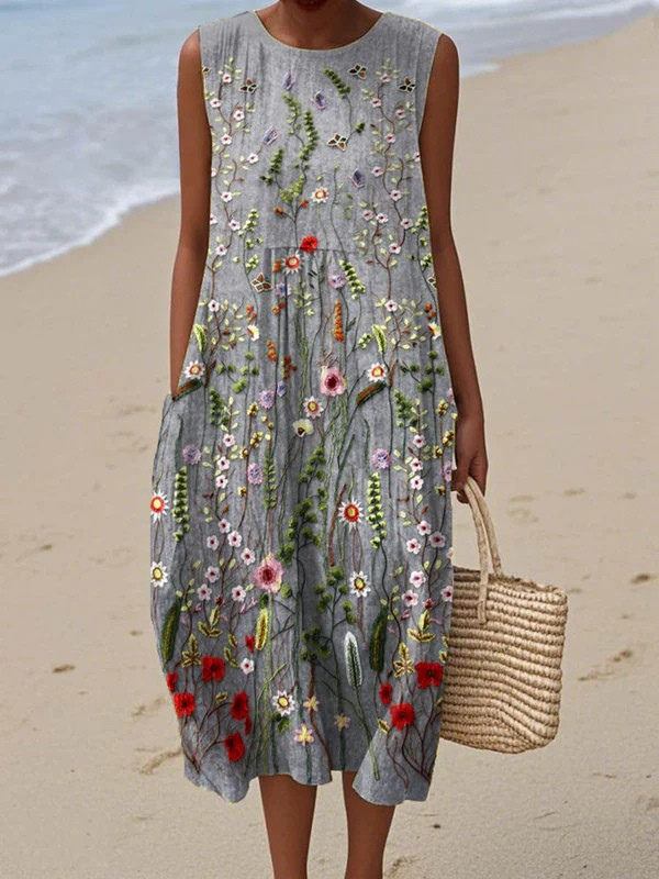 Women's elegant wildflower print sleeveless midi dress, perfect for summer fashion, vacation wear & spring outfits.