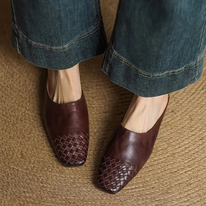 Women's comfortable woven mules, featuring a distinct square toe and subtle low heel.