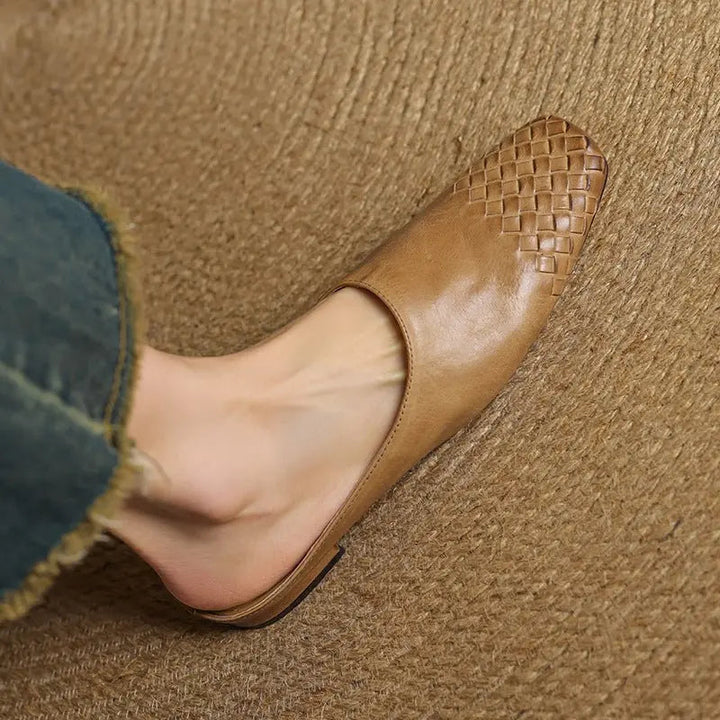 Chic slip-on woven mules for women, featuring a stylish square toe and low heel.