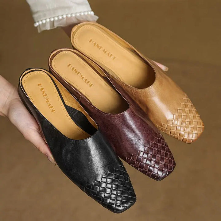 Fashionable women's woven mules with a stylish square toe and comfortable low heel.