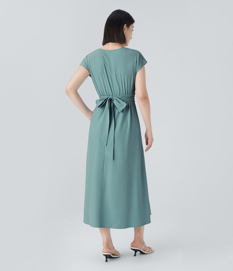 Trendy women's short sleeve V-neck wrap midi dress. High waist for a flattering silhouette & modern fashion.